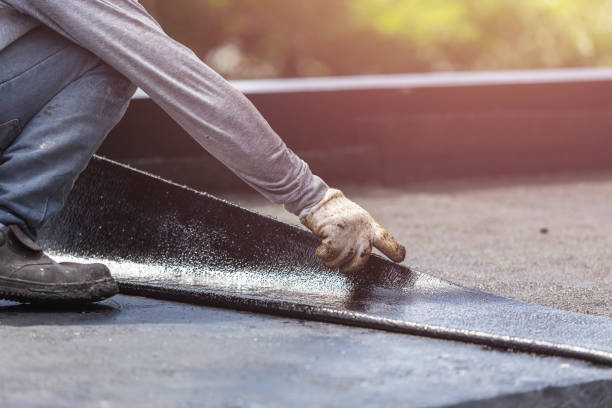 Professional Basement Waterproofing technician working in El Dorado, AR